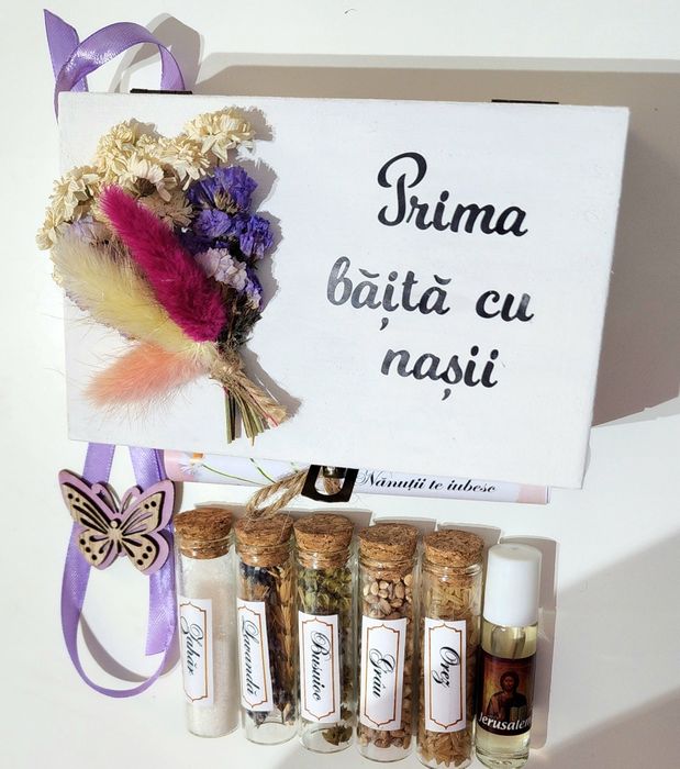 Prima băiță cu nașii