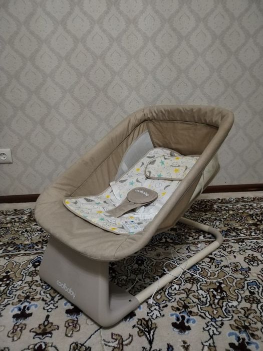 Шезлонг электронный, почти новый. Очень мало пользовались. С рождения.