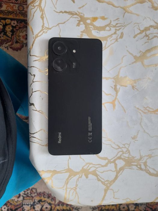 Телефон редмй 13с