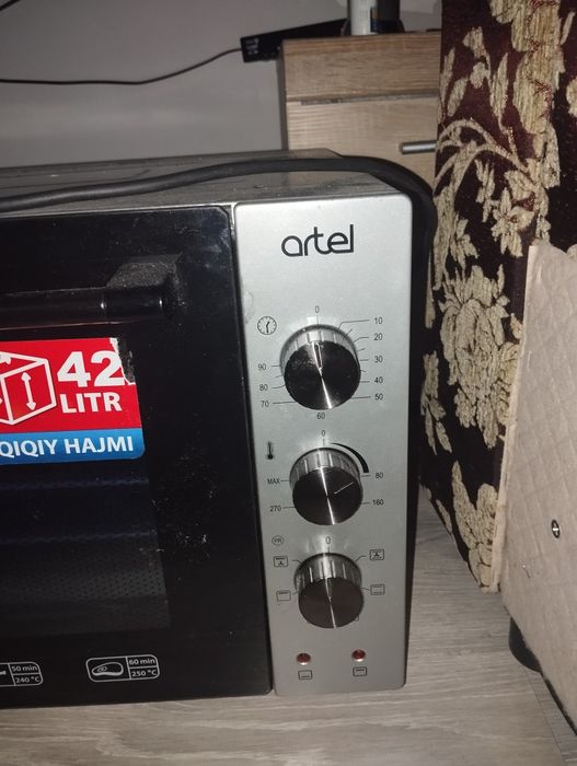 Продам электропечь  Artel, объем 42 литра