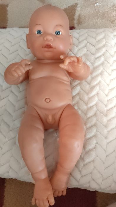 Пупс со стульчиком для кормления.