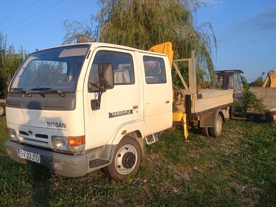 Vând Nissan,3,5 t , basculabil,cu macara