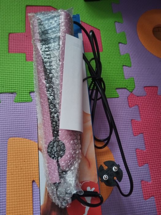 Placă de îndreptat părul