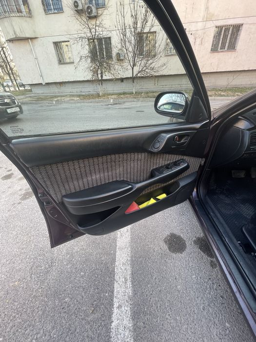 Тойота карина е 1993 год