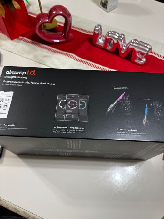 Dyson air wrap sigilat