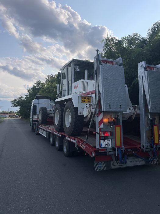 Transport utilaje, marfa, agregate,inchiriere trailer