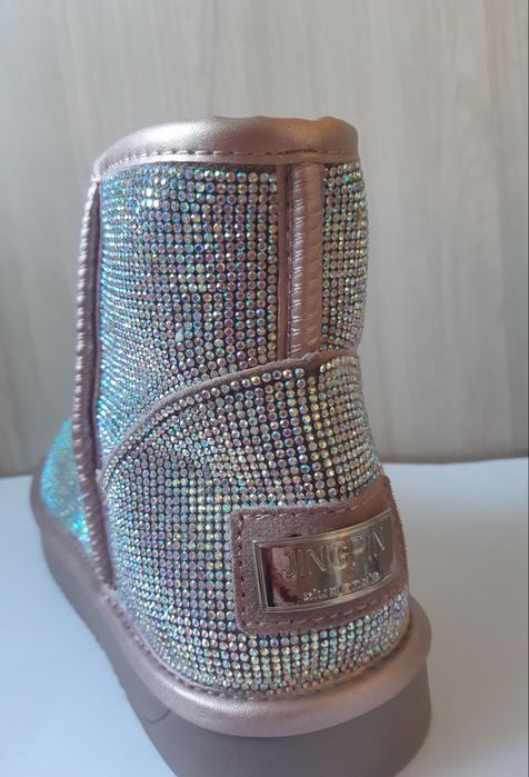 Продам новые сапоги.