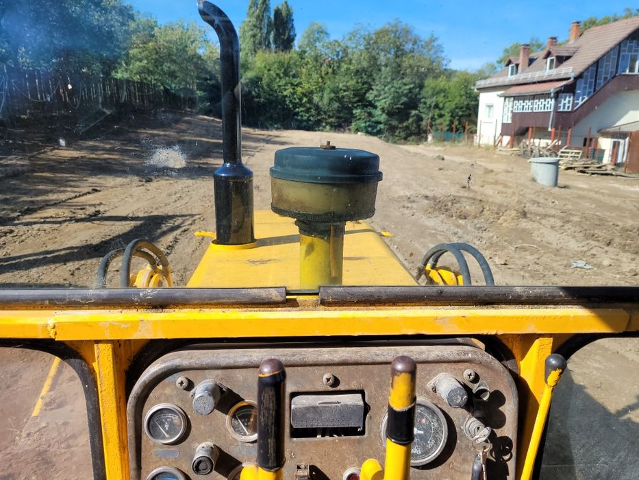 Vand buldozer sau schimb alt utilaj sau auto