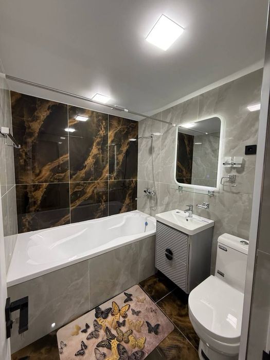 Чиланзар 2в3/2/5 ул.Мукими Дом вдоль дороги