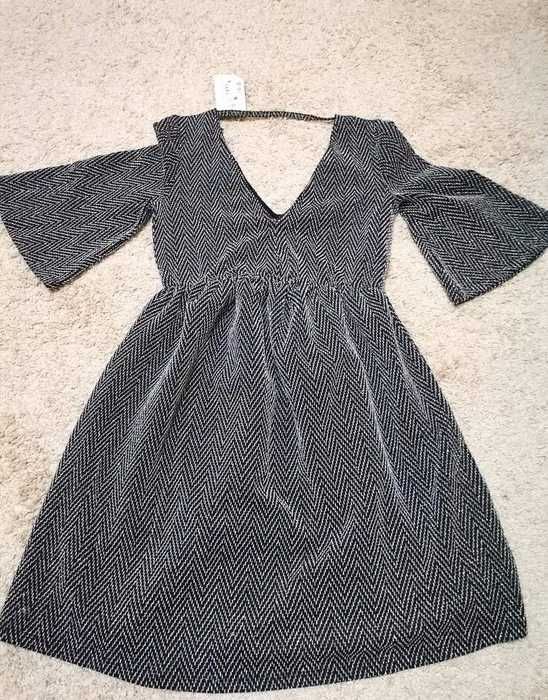 няколко вида дамски къси рокли и блузи чисто нови