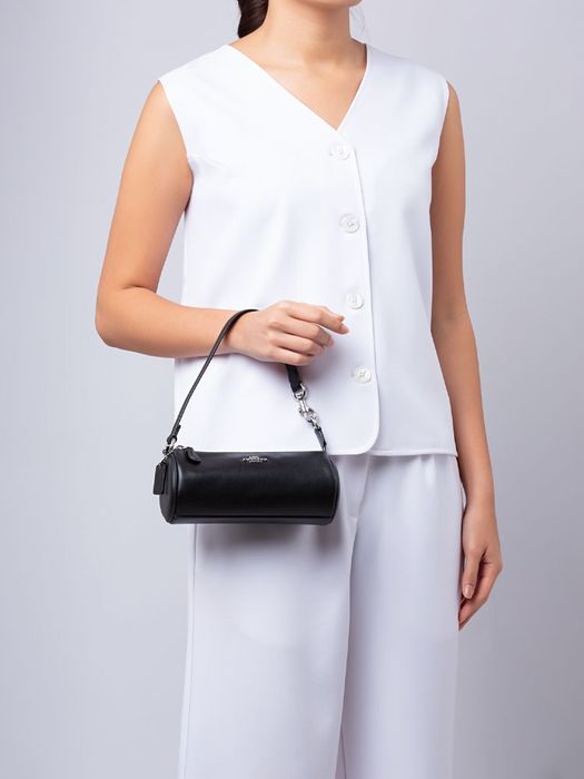 Чанта клъч Coach