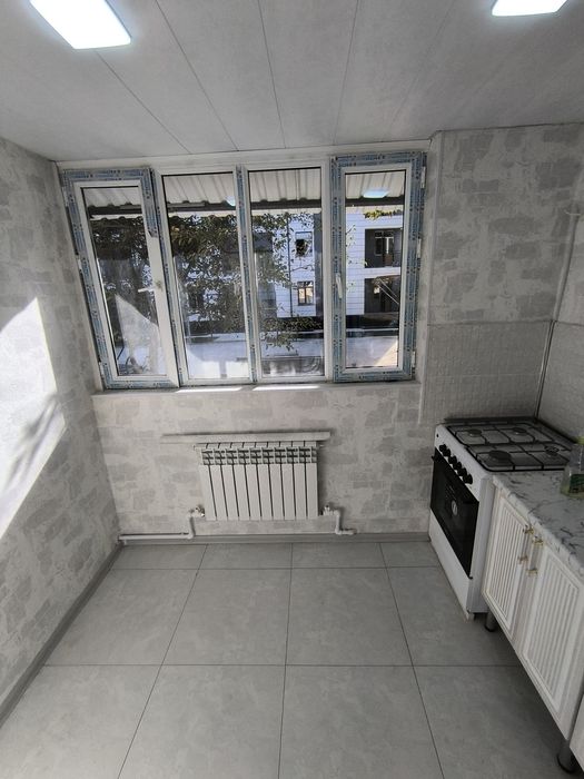 2 х комнатную квартиру Янгиюль. Новый евро ремонт. Первый этаж