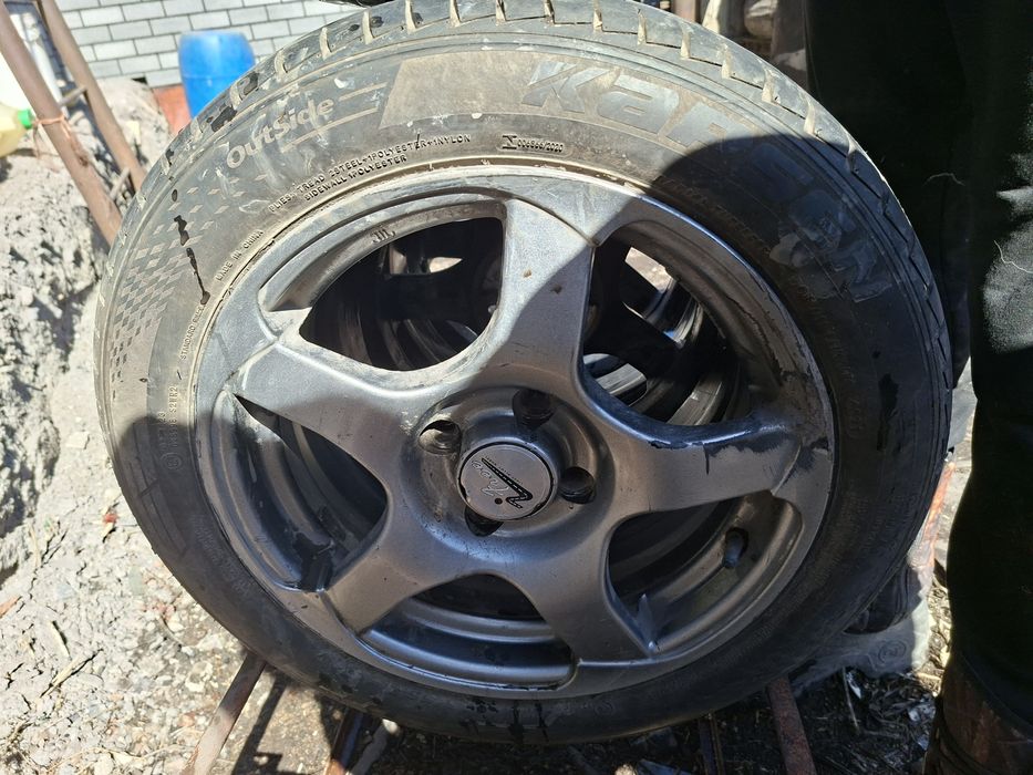 Продам комплект летних шин с дисками R15