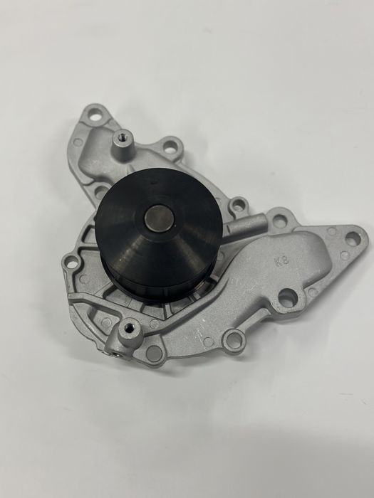 Помпа водяная Mitsubishi MD973162