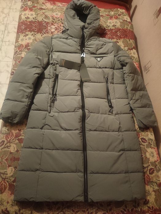 Продам новый пуховик