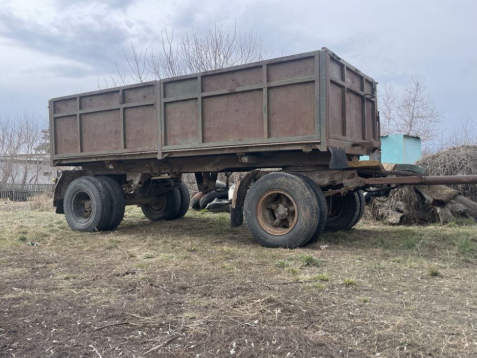 Прицеп бортовой зерновоз