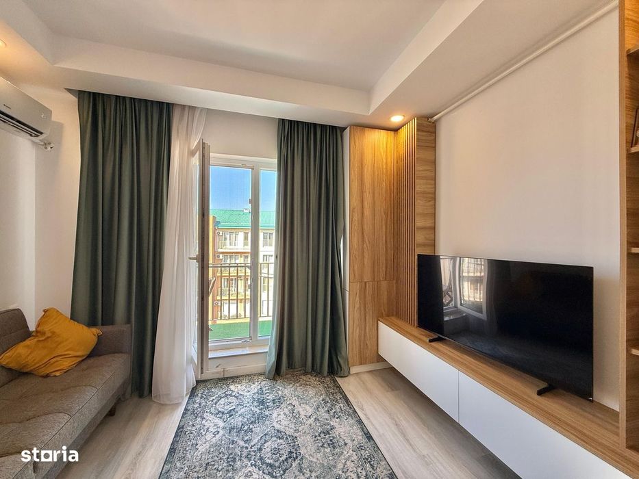 COSMOPOLIS - Apartament cu 2 camere tip studio, mobilat si utilat.