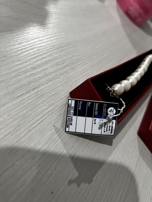 Браслет жемчуг с золотом.