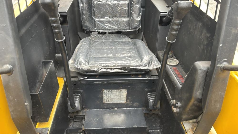 TCM Bobcat 604 погрузчик