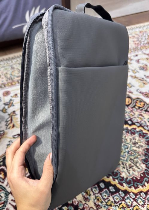 Сумка для ноутбука, размером 34×23 см.