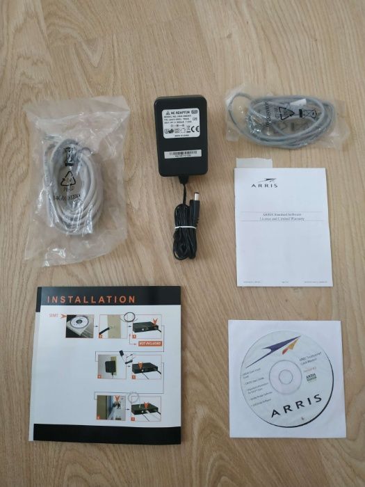 продам модем Arris
