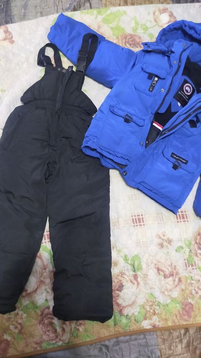 Продам комбинезоны на девочку и мальчика