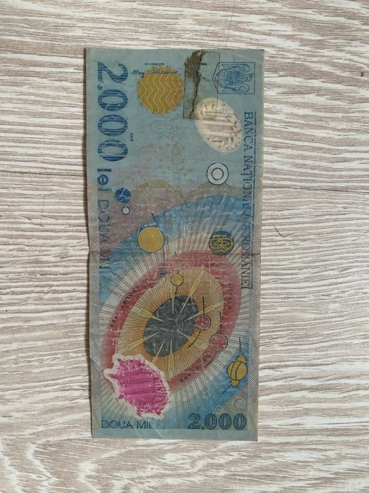 Vand o bacnota  de 2.000 lei , o bacnota rusa de 10 ruble si o moneda