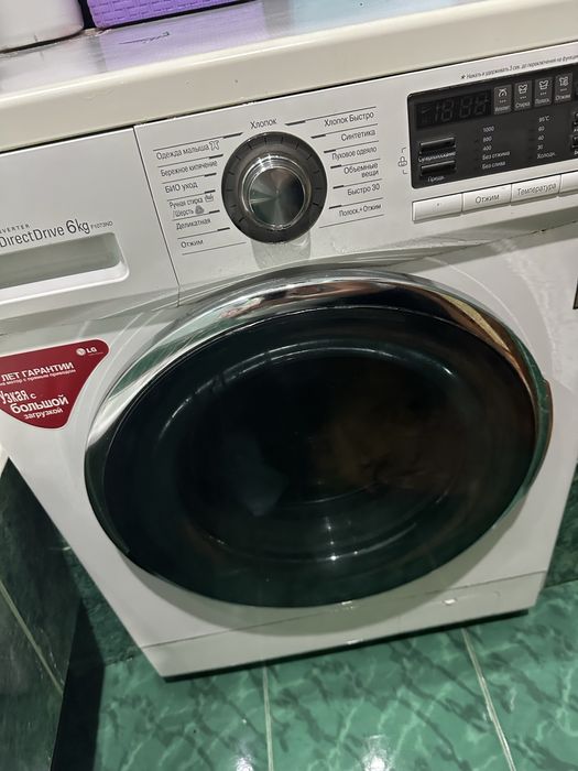 Машинка стиральная в среднем состоянии