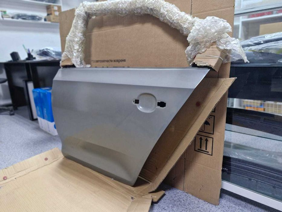 Дверь задняя левая L Skoda RAPID