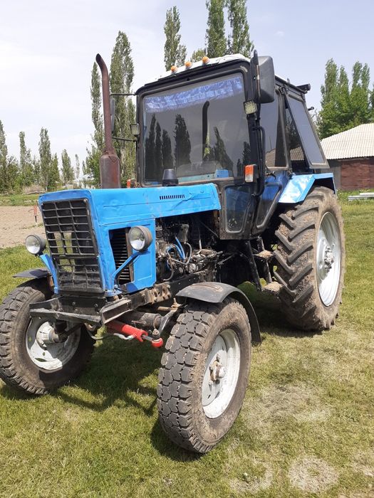 Трактор мтз 80 с плугом