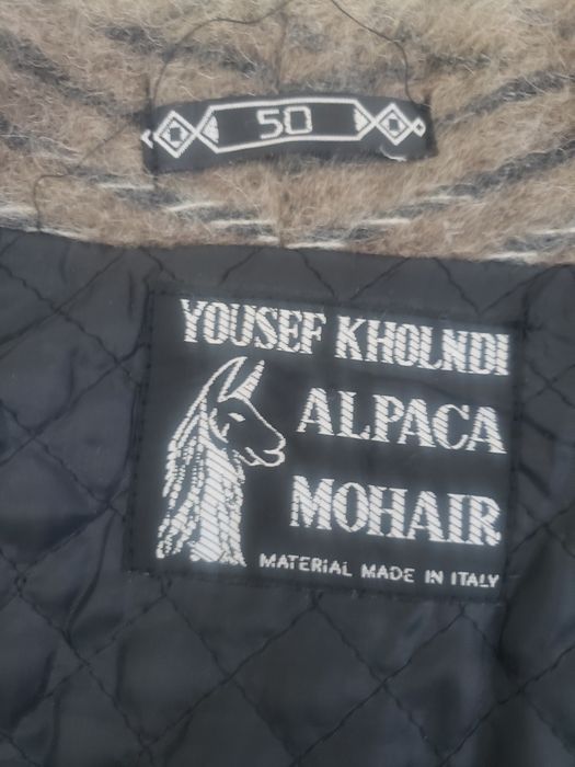 Продам новое демисезонное пальто