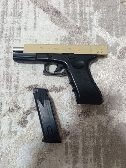 Игрушечный пистолет glock размер 9x19
