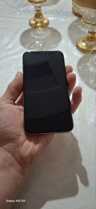Iphone XS LLA Gold tozza ochilmagan