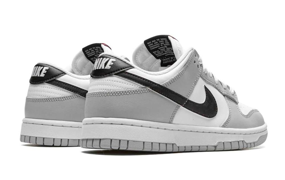 Nike dunk low retro se Lottery Grey original