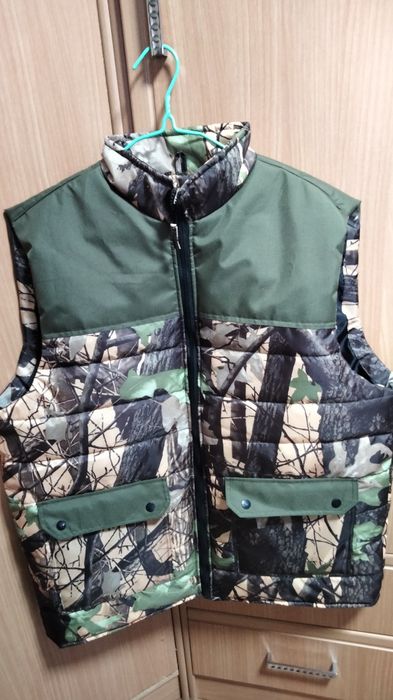 Продам жилетки новые