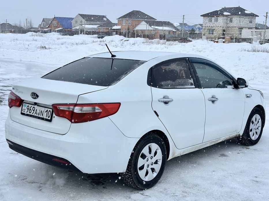Kia Rio 1.4 MT 2014 год