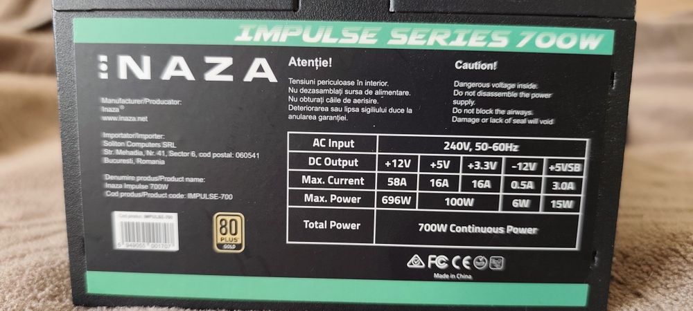 Kit placă de bază cu procesor, placă video și sursă.