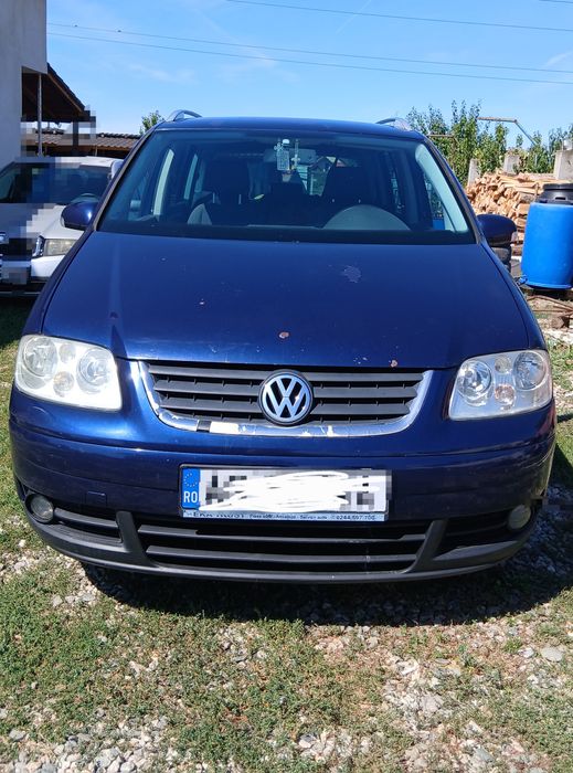 Vw touran      .
