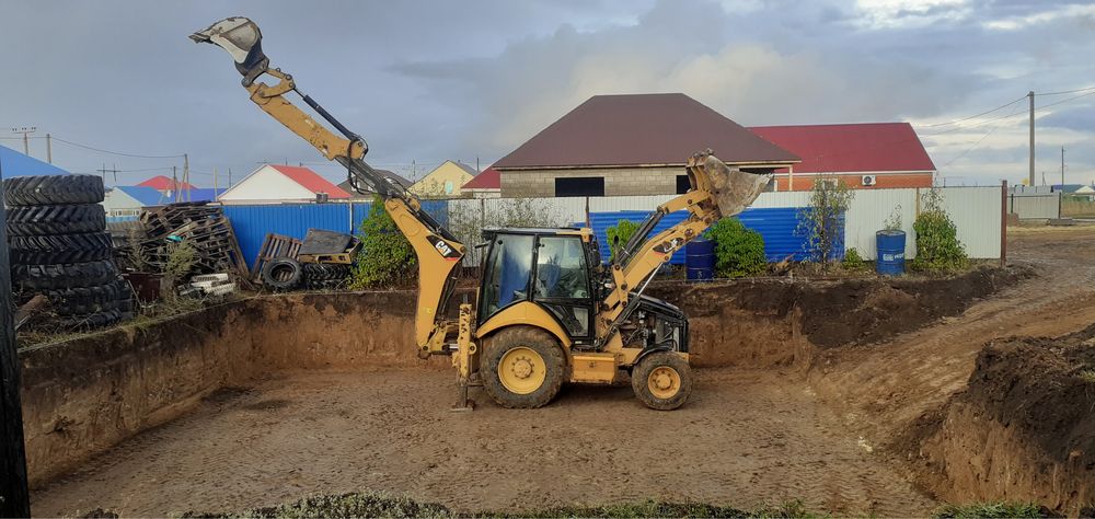 Эксковатор погрузчик