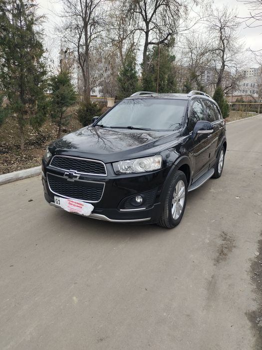 Captiva 3 Avtomat rangi qora benzinda yurilgan xolati butun.