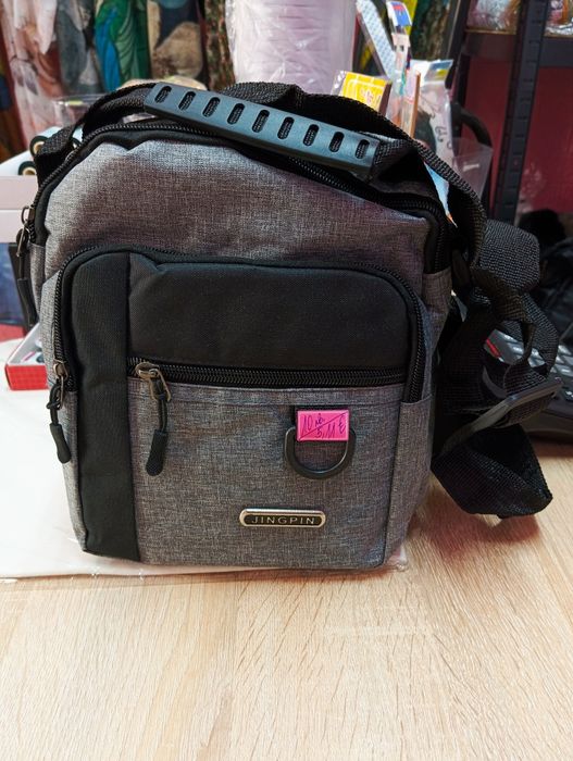 Мъжка чантичка с дълга дръжка