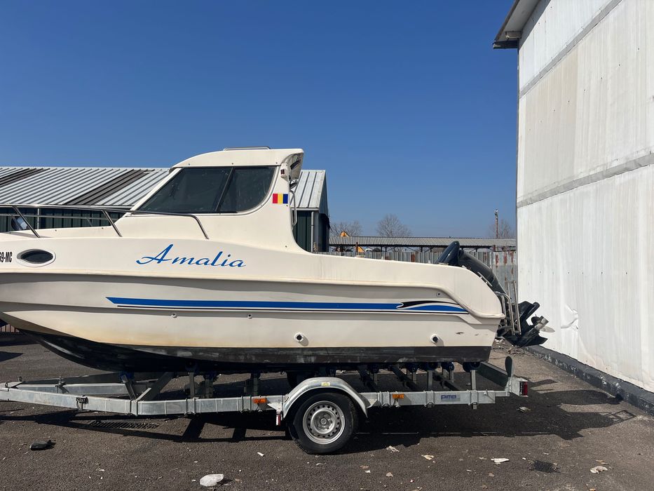 Barcă Saver Manta 21 Fisher cu motor Suzuki 140 cp și peridoc