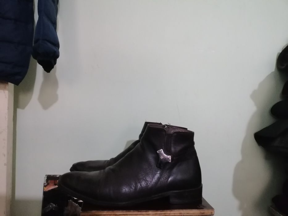 Продам фирменные сапоги.