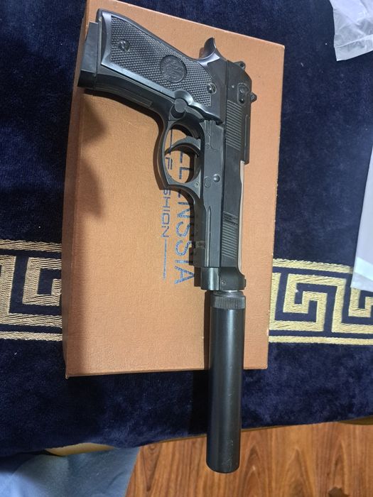 Игрушечный пистолет фирмы P.BERETTA