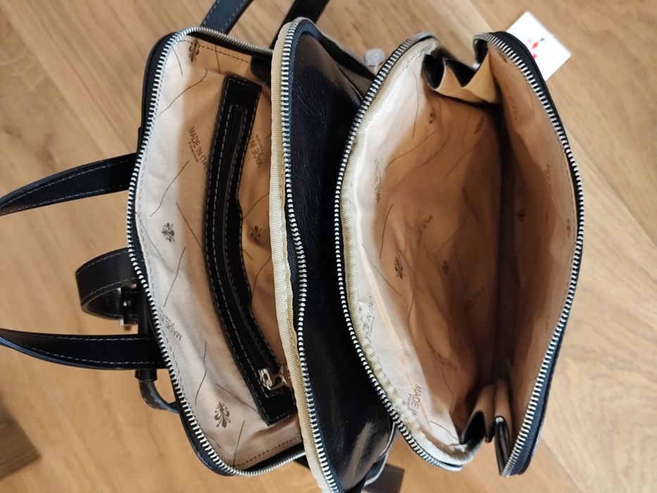 Продавам италианска черна раница от естествена кожа. Нова