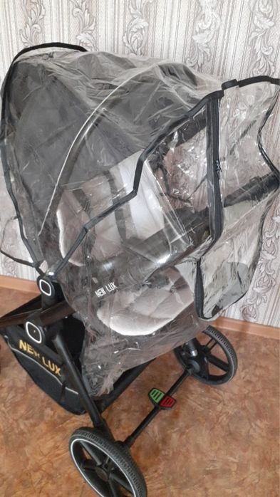 Продам коляску и стульчик для кормления