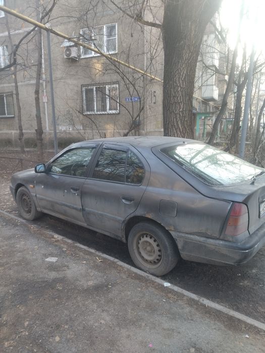 Ниссан примера машина