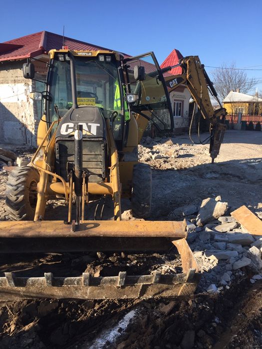 Lucrari cu buldo cu picon miniexcavator bobcat