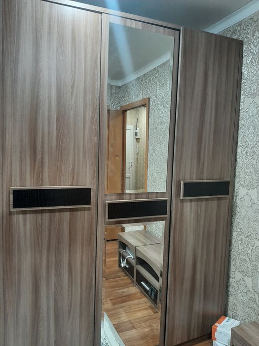 Спальный гарнитур серого цвета