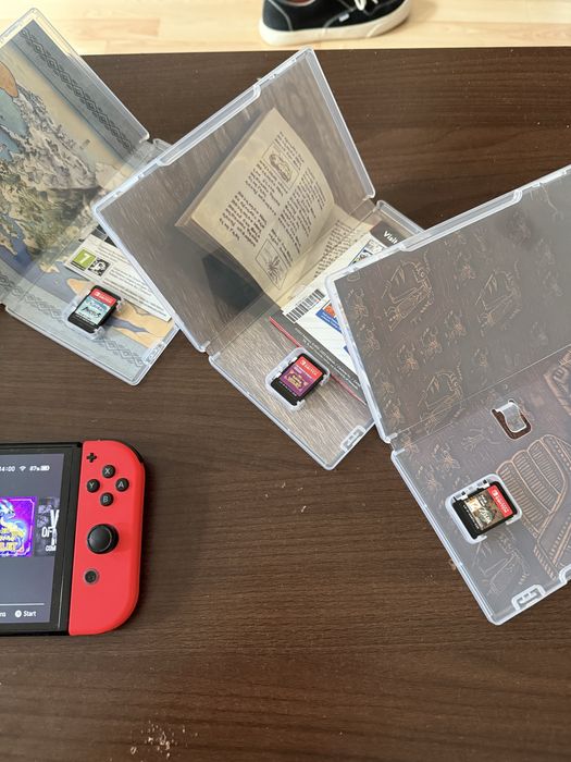 Nintendo Switch 1 OLED plus 3 jocuri